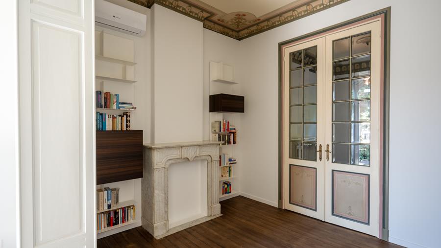 Een herenhuis met een gouden randje