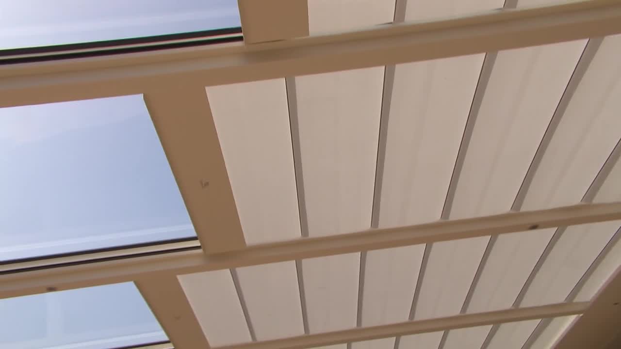 HOE EEN ZONWERING PLAATSEN AAN JE OVERKAPPING